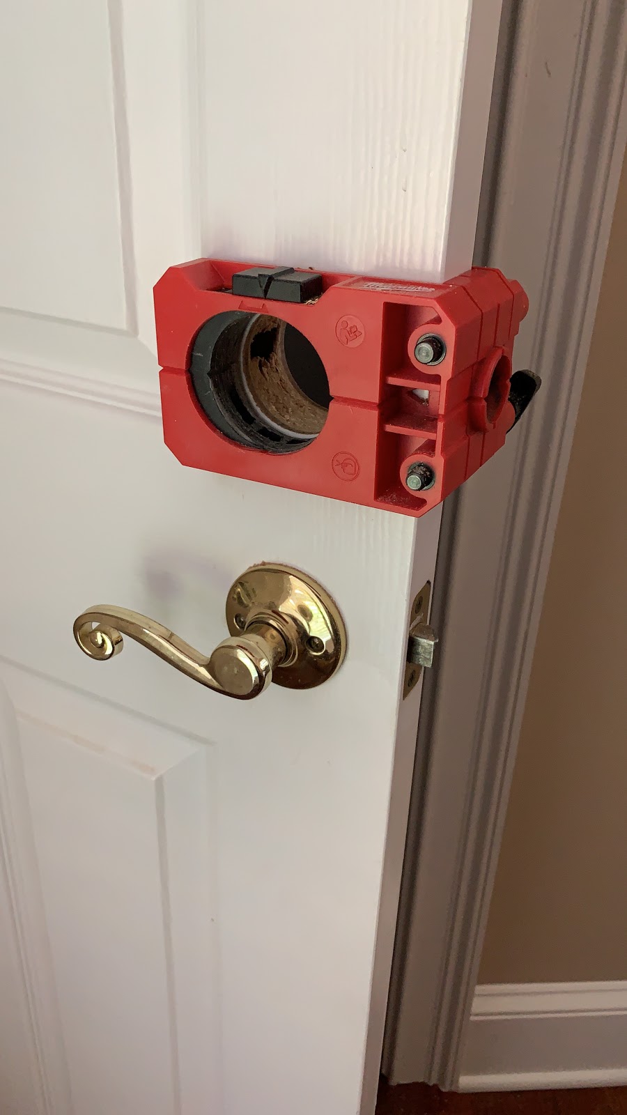 Residential door lock being serviced by iLocksmith in Sandy Springs